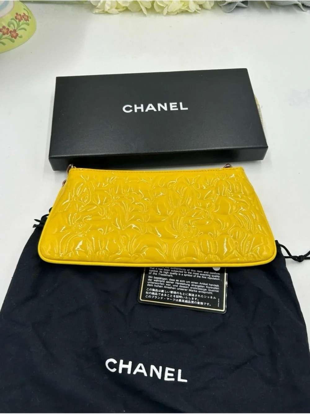 Chanel patent leather floral embossed shoulder bag made in Italy